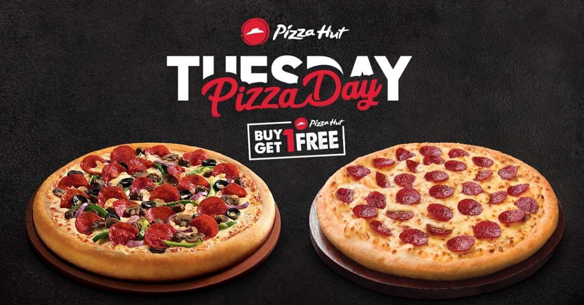 Time for that mid-week treat! Buy any large or medium pizza and get one absolutely FREE every Tuesday at Pizza Hut!